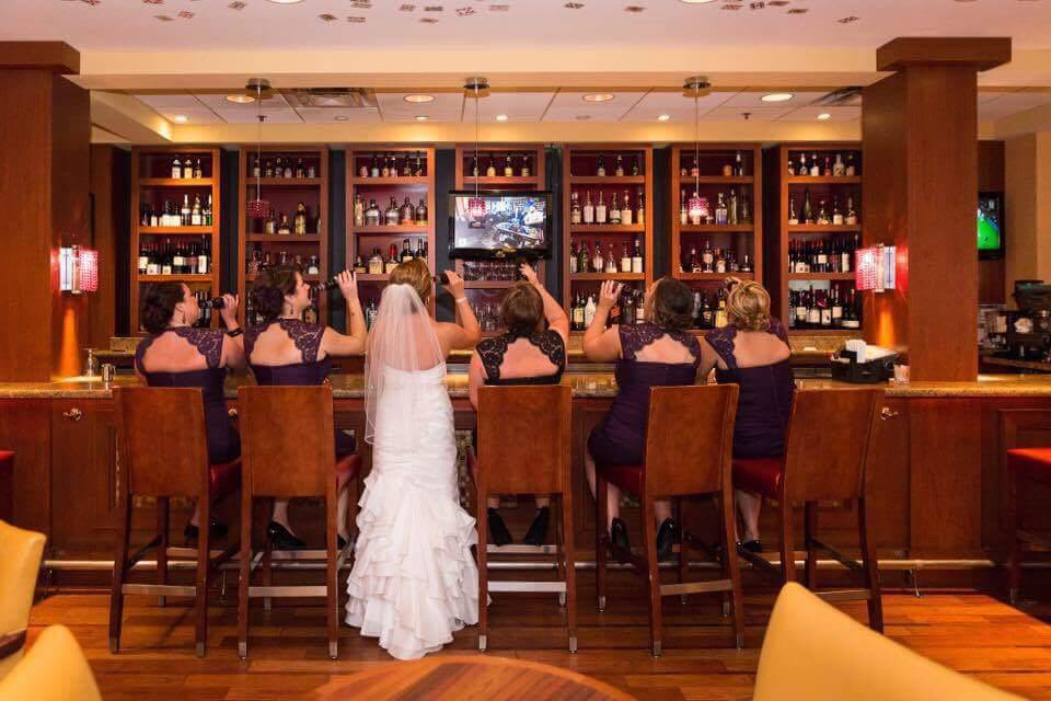 CLEMarriott's tweet photo. Cheers to Jaime and Kevin! @AMP150Cleveland bar never looked so good! James Chernish Photography #clewedding #clebride #clemarriott https://t.co/la5Y2oPPON