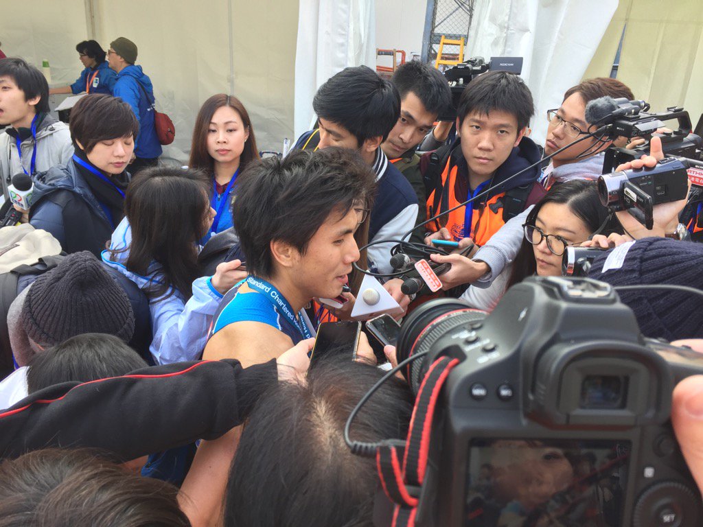 fredattewill's tweet photo. Hong Kong's top runner Tsui mobbed after finishing the marathon https://t.co/FbPklxbpeU