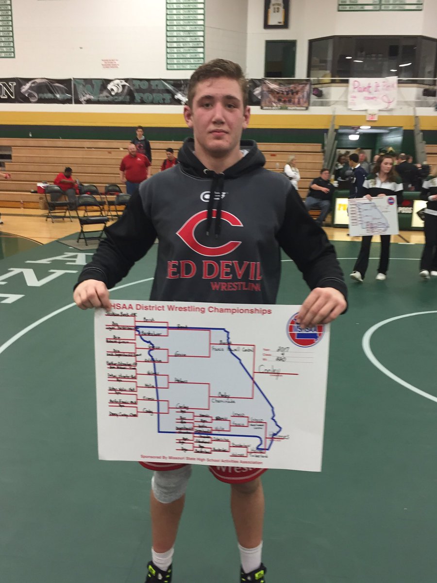 CCPwrestle's tweet photo. Down goes the defending state champ!  Danny Conley knocks off Jackson Berck 2-1 in OT to win the district title!  @WeAreChaminade https://t.co/lcvBVWfESH
