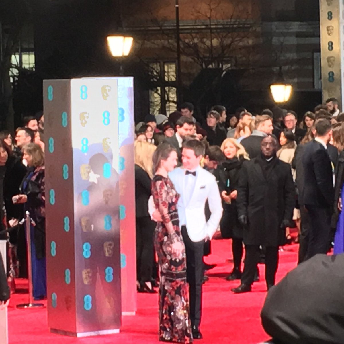 BFI's tweet photo. The stars arrive on the #EEBAFTAs red carpet ahead of this evening's awards ceremony. Here are Viola Davis and Eddie Redmayne https://t.co/faJPEOz3am