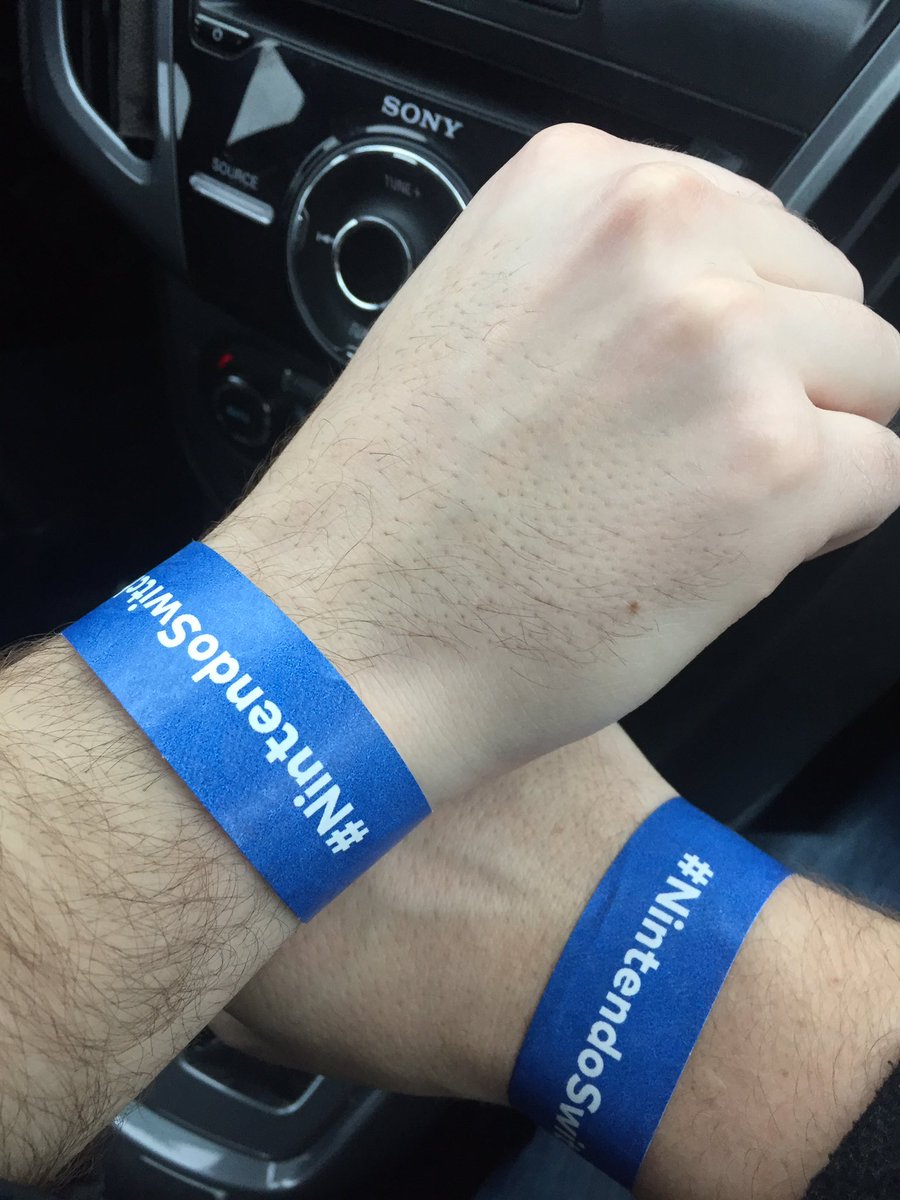 SwitchDen's tweet photo. Got our wrist bands and time slot. Can't wait to play the #nintendoswitch in a few hours! @NintendoAmerica https://t.co/Z3pomRXudh