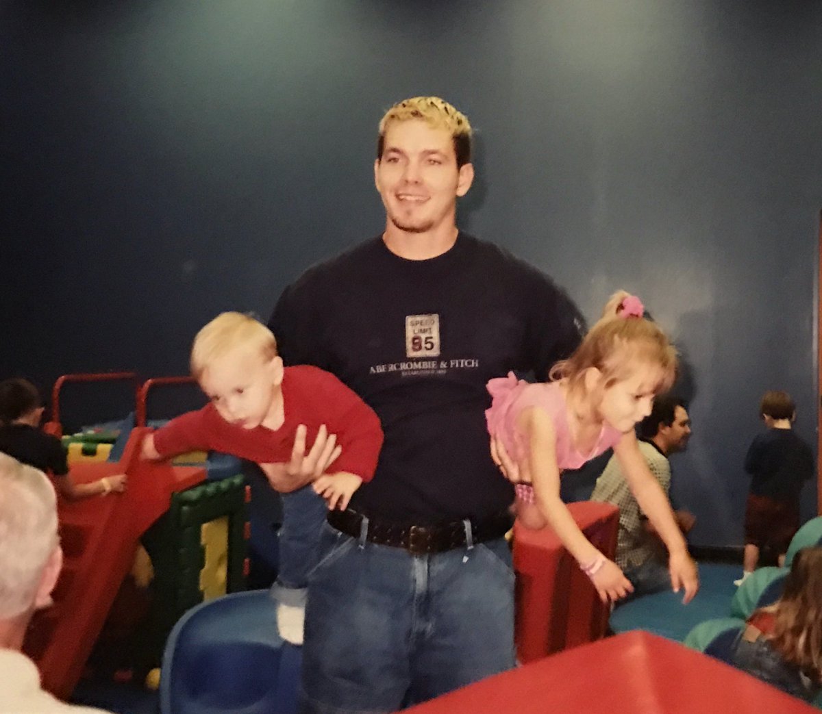 RareKayden's tweet photo. Tell me why kaydens dad is holding him like a weapon tho - that diaper mustve been lethal man idk https://t.co/E9UDXkbRpR