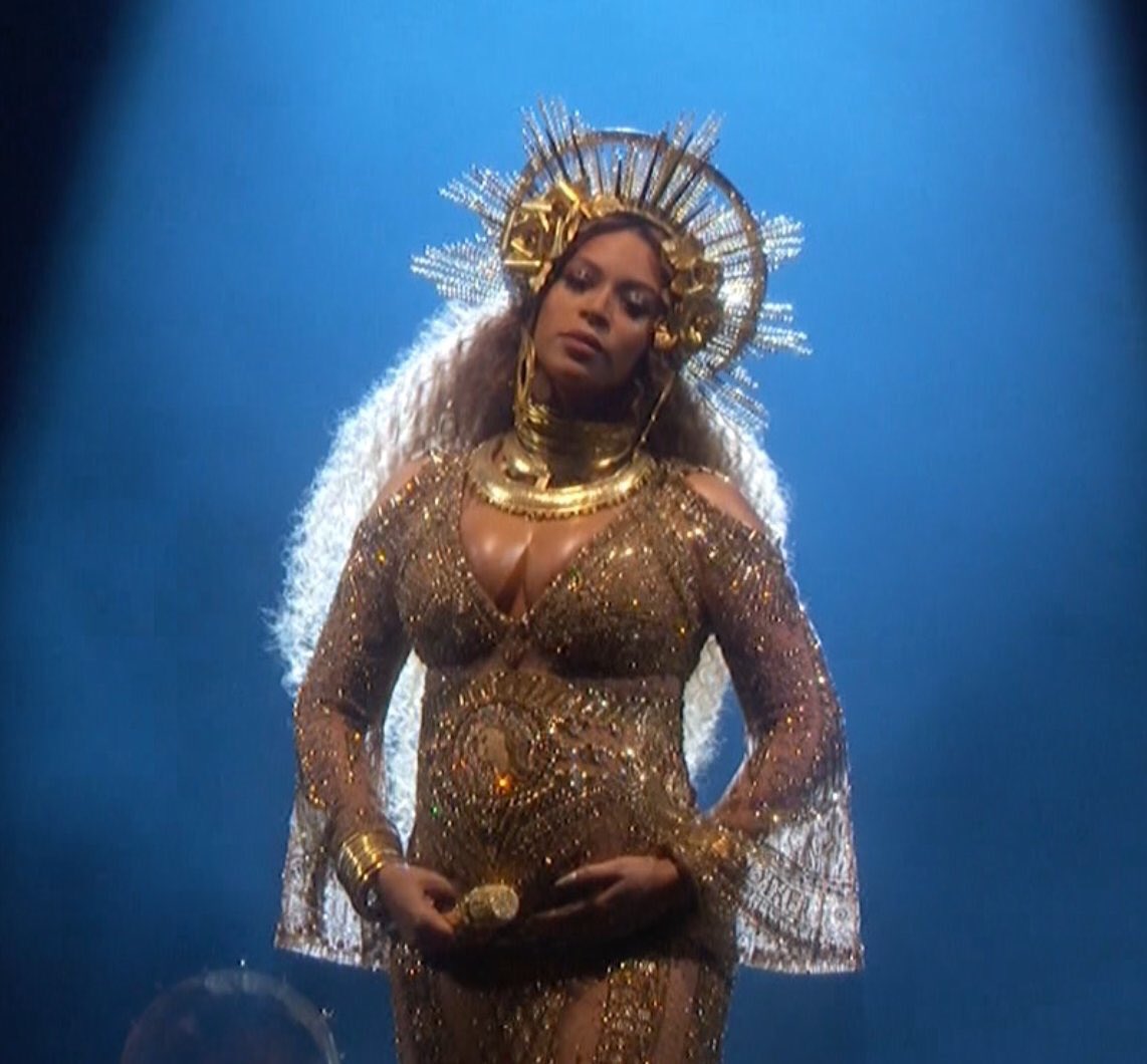 ClassyCatholic's tweet photo. Who wore it better? #GRAMMYs https://t.co/zojYO5O3L4