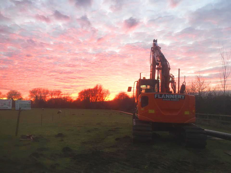 Amazing colours in the sky in the background of this #Hitachi #excavator shot.