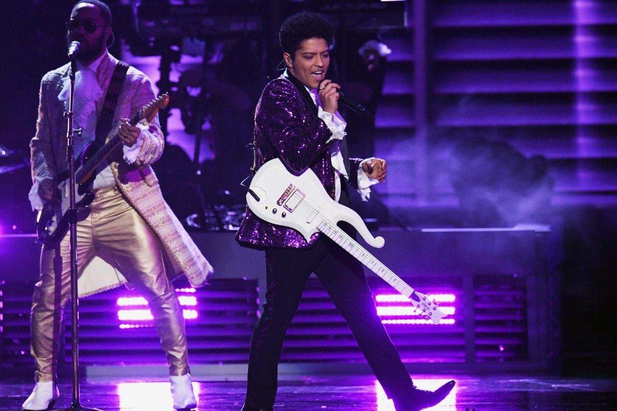 SPIN's tweet photo. Watch @BrunoMars perform “Let’s Go Crazy” at the Grammys' tribute to Prince https://t.co/zp8zzEOa3i https://t.co/zTsQSBGflr