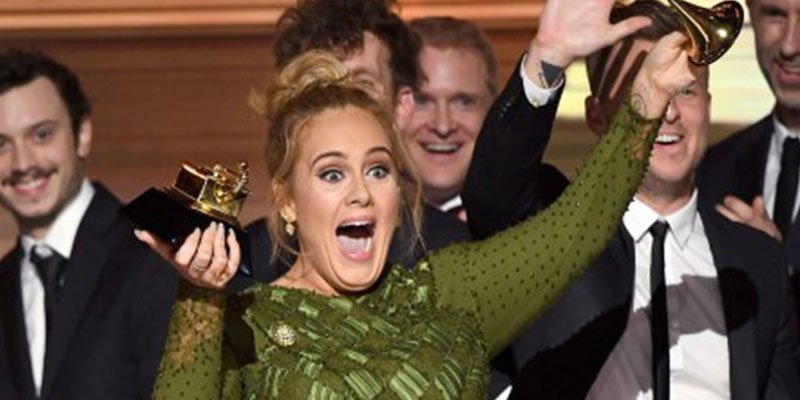 people's tweet photo. Adele breaks #GRAMMYs award in half to give to Beyoncé: 'What the f--- does she have to do to win?' https://t.co/MLduJzVJyH https://t.co/7Ps65ZfODI