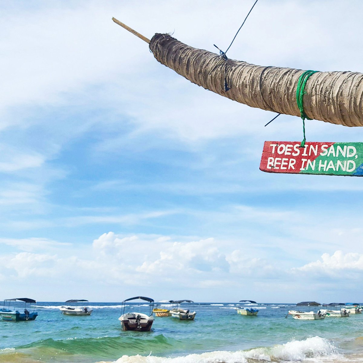 jmin89's tweet photo. 'Toes in sand, beer in hand,' this place has it right! 😂🍺🌴 #beach #beachlife #travel #travelblogger #travellife #srilanka #hikkaduwa https://t.co/nes1XSM4nk