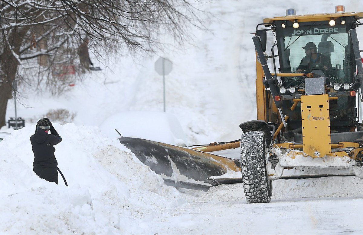 OttawaCitizen's tweet photo. Captured by our photographer this morning: The agony of the plow pushing all the snow back into your driveway https://t.co/87964X164A https://t.co/EIbzlZ9CSI