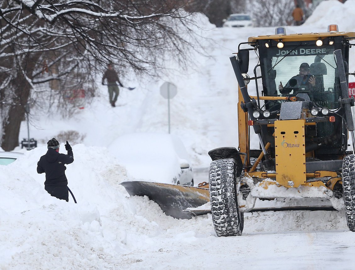 OttawaCitizen's tweet photo. Captured by our photographer this morning: The agony of the plow pushing all the snow back into your driveway https://t.co/87964X164A https://t.co/EIbzlZ9CSI