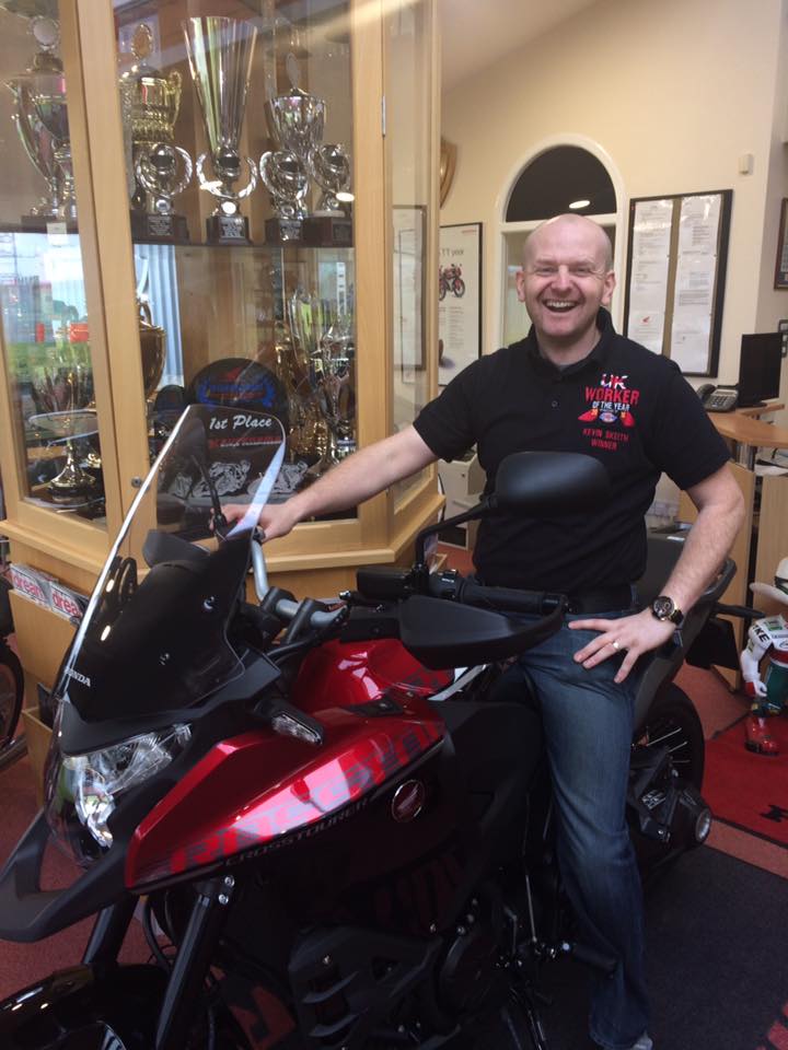 workeroftheyear's tweet photo. @kevinskeith looks very happy with his prize from @HondaUKBikes and @DickiesEurope #UKWOTY https://t.co/olsEbLgwTy