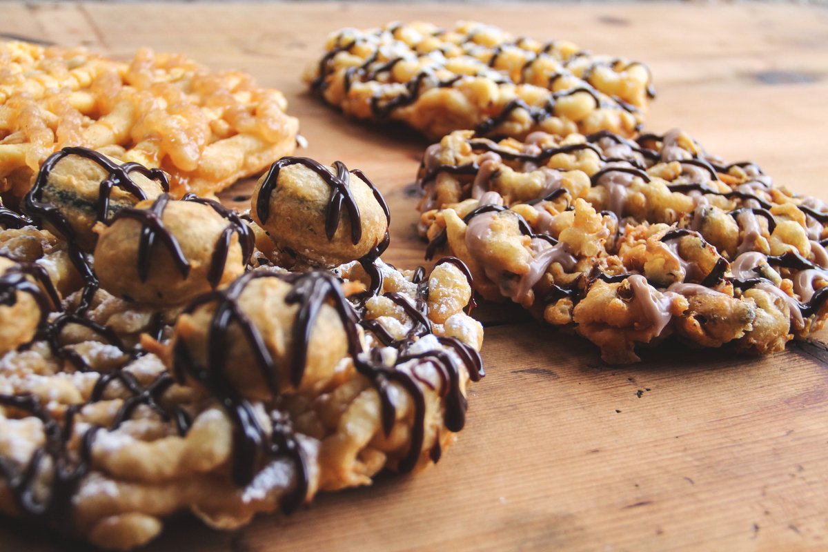SDCAttractions's tweet photo. You see those delicious looking mounds on top of that one funnel cake? Those are FRIED Oreos. Yeah.
#YearOfFood https://t.co/xRb59IC0by https://t.co/DfcFwbgFT4