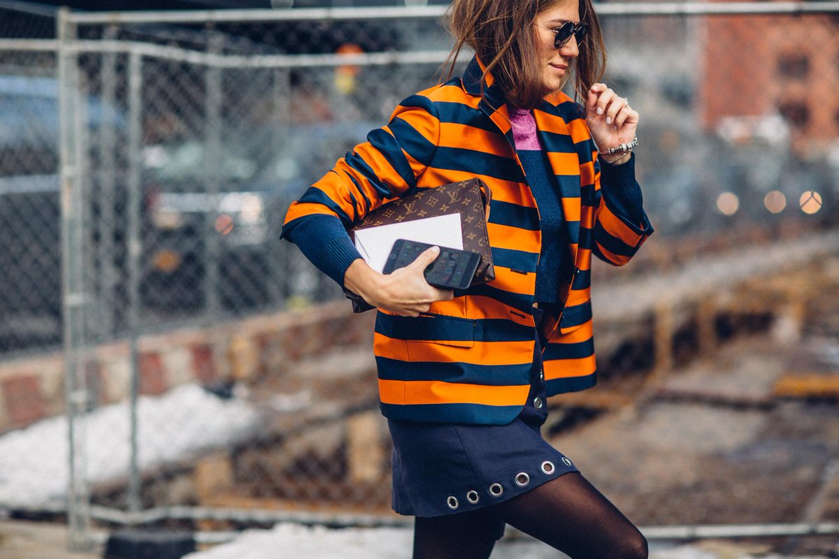 Spotted: Coats in colorful prints on the streets of Day Five at #NYFW.