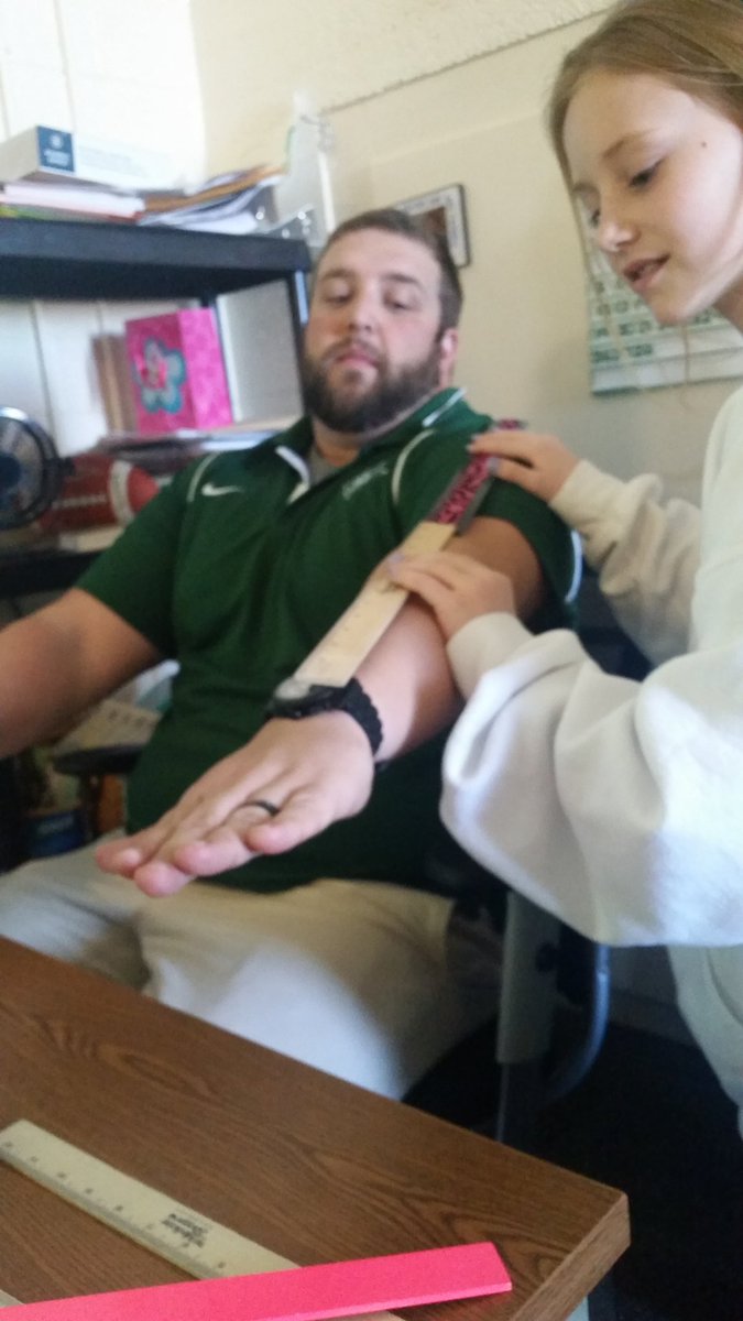 TOPS2ndGrade's tweet photo. Now measuring Mr. McCall's arm length https://t.co/R9HZHWfH5K