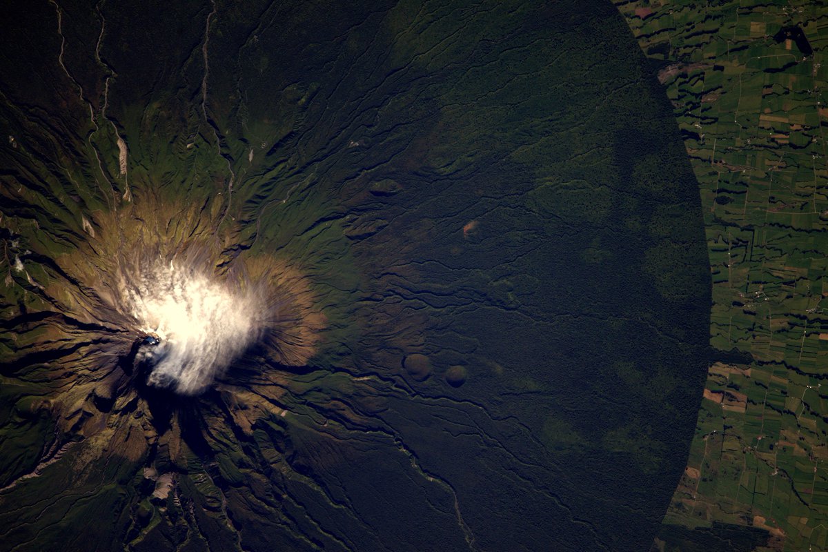 The Taranaki volcano in #NewZealand is a perfect circle emerging from the green forest flic.kr/p/S6ypvt