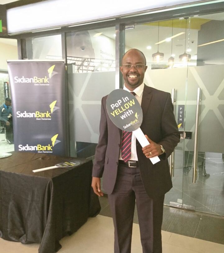 SidianBank's tweet photo. Our CEO @titus_karanja spreading the yellow love ๐ with an infectious smile... #Owntomorrow #Tworivers_KE https://t.co/g0ZPQ0dmhD