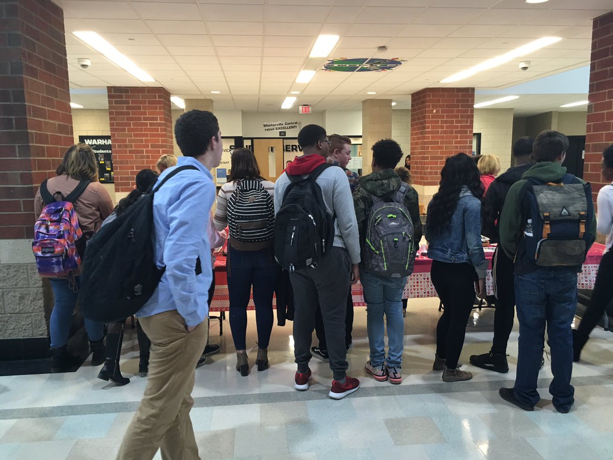 WCHS_Warhawks's tweet photo. The academic booster team is here and working hard to support students at Central.  Students are excited to see them! #hawkcommunity! https://t.co/igBfRKDOtT