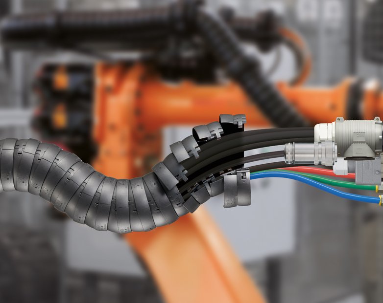 CableTechnology's tweet photo. Harnessed dress-packs provide maximum cable protection for welding robots https://t.co/jrmeGMuW3D #robotics #cablechains #cable #automation https://t.co/Da8tsl3FyU