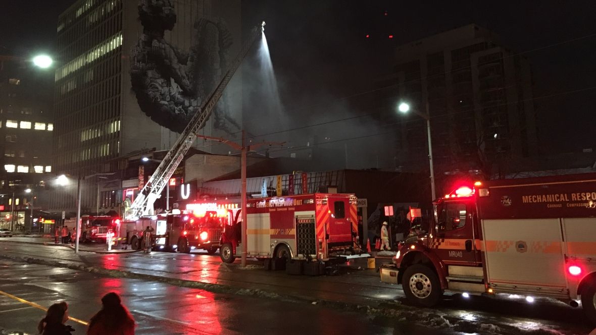 CBCToronto's tweet photo. Toronto firefighters are working overnight to defeat the fire at Yonge and St. Clair https://t.co/hubdD6Ct3r https://t.co/csOWrbXM7c