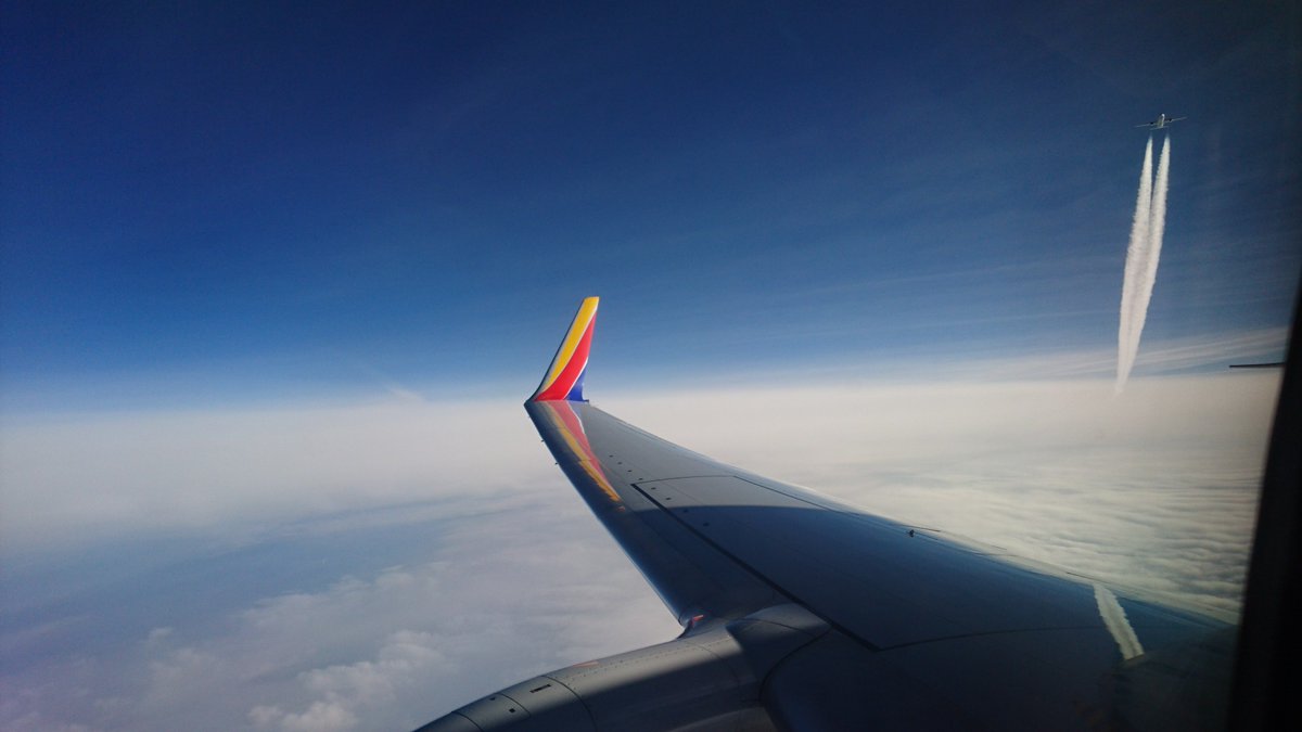 _johny's tweet image. Probably the closest I've seen another airplane crossing paths. Hard to judge distance at 30k ft...