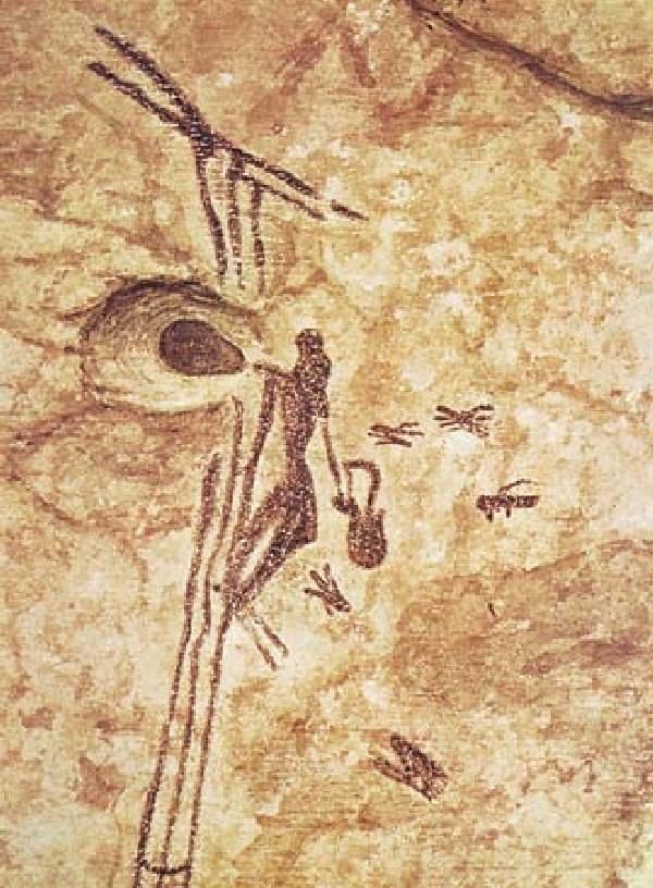 artinsociety's tweet image. 8,000 years ago, an artist depicts man hanging onto vines to get honey from beehives (Cave of the Spider, Valencia)
