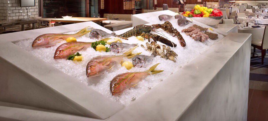 LobsterBarMiami's tweet photo. At the heart of the restaurant you’ll find a glass display showcasing the day’s fresh catch. It’s about quality you can see, and taste. https://t.co/5GbzRlXf96
