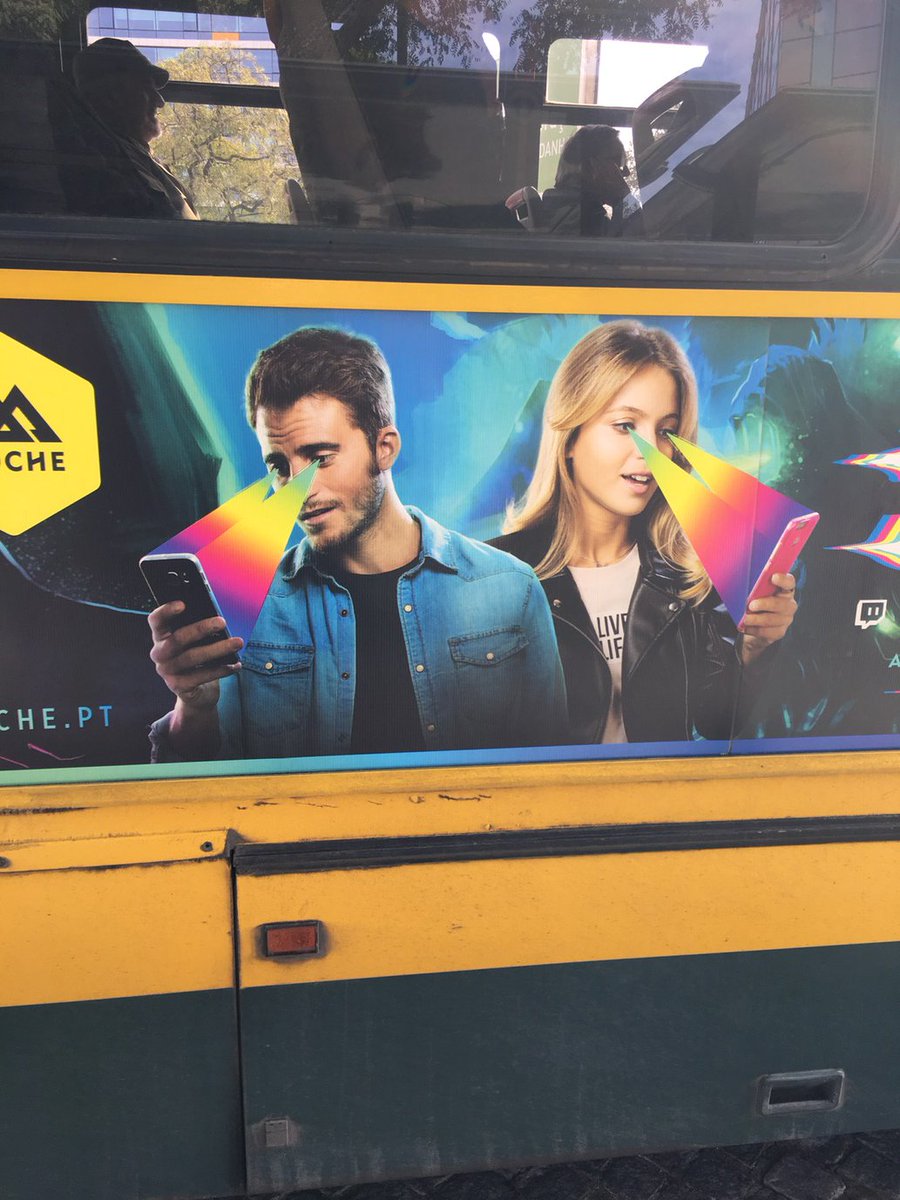 Great phone advert on Portuguese bus. "Our handsets will LITERALLY BLIND YOU WITH LASERS!!" Awesome.