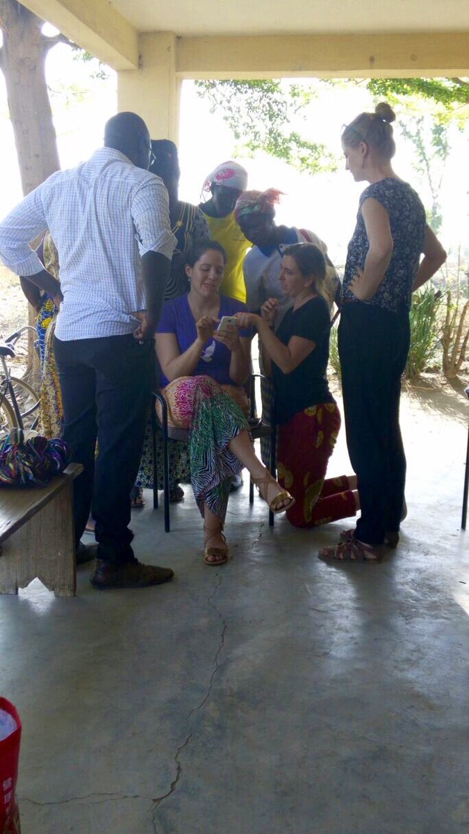 PernilleHoej's tweet photo. Community Health Workers in Kpindi,Togo take a look at the #MedicMobile app during a study trip by @Medic to @HTHGLOBAL sites #globalhealth https://t.co/1zSnbfJiG6
