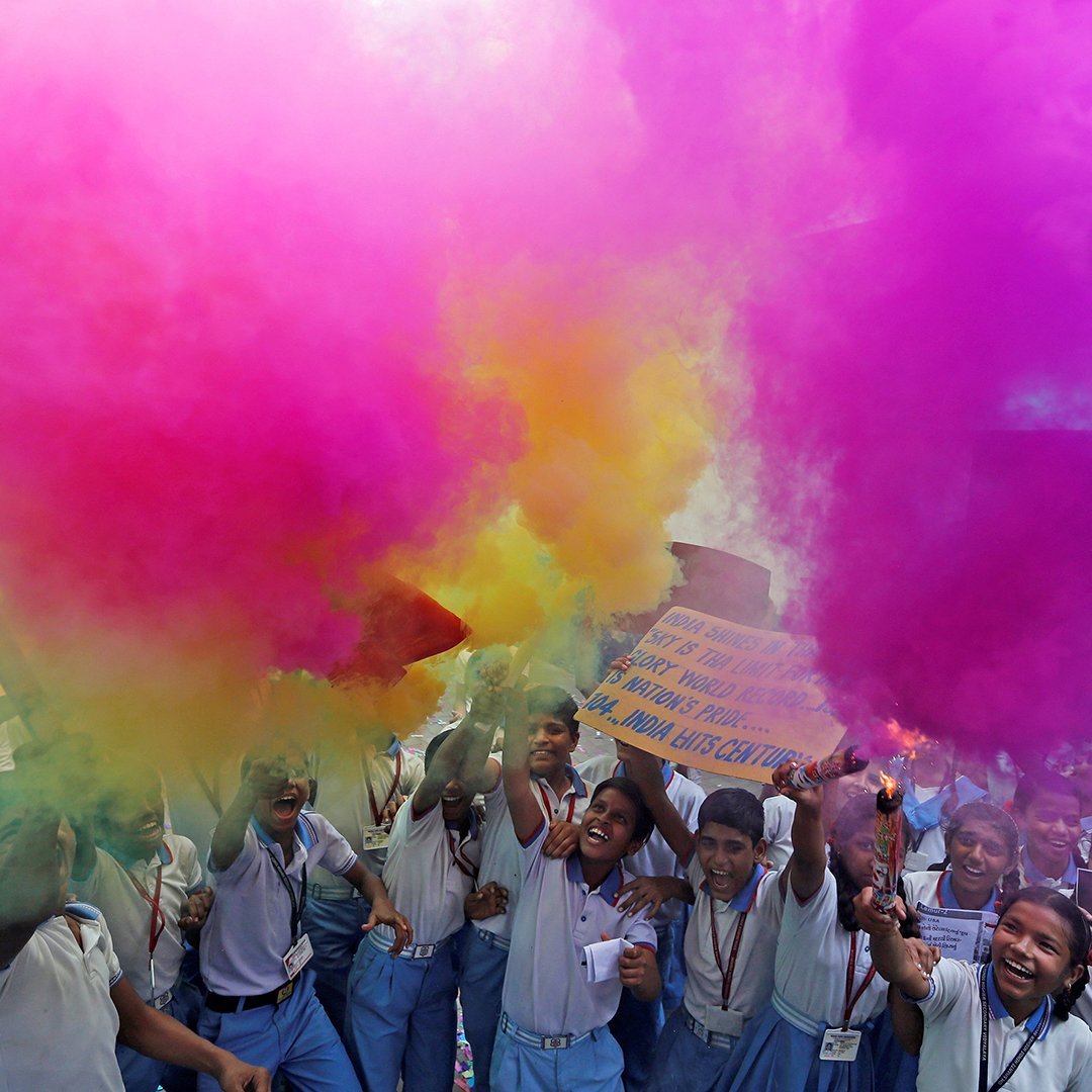 TheEconomist's tweet image. School children celebrate the launch of India’s #PSLVC37 rocket, which sent 104 satellites into orbit, February 15th 2017 (Reuters)