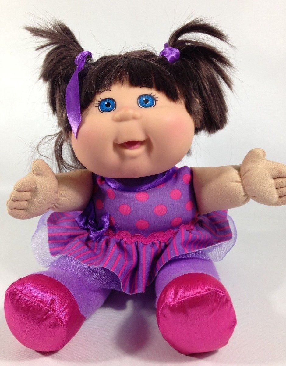 cabbage patch doll with pigtails