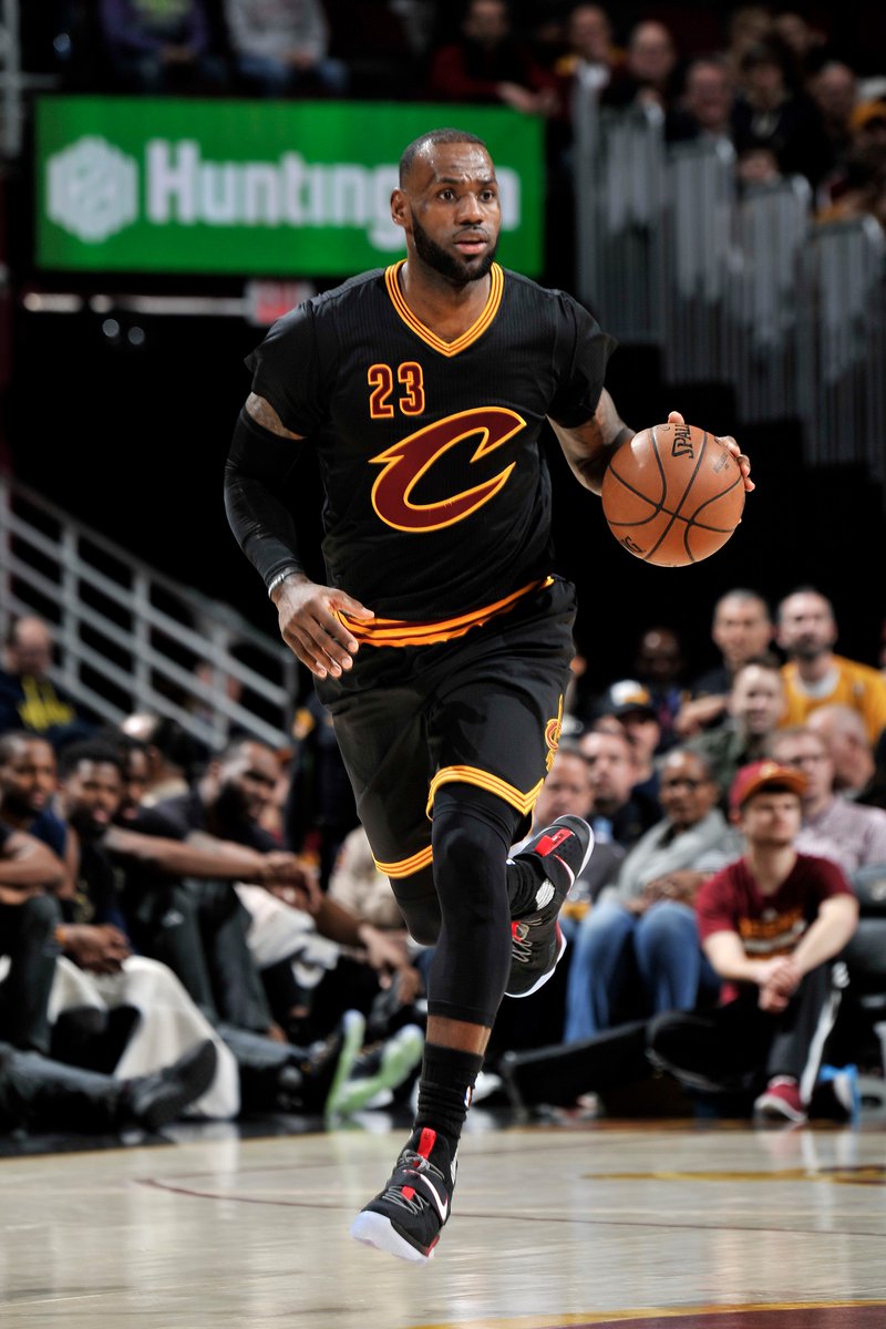 black and gray lebrons