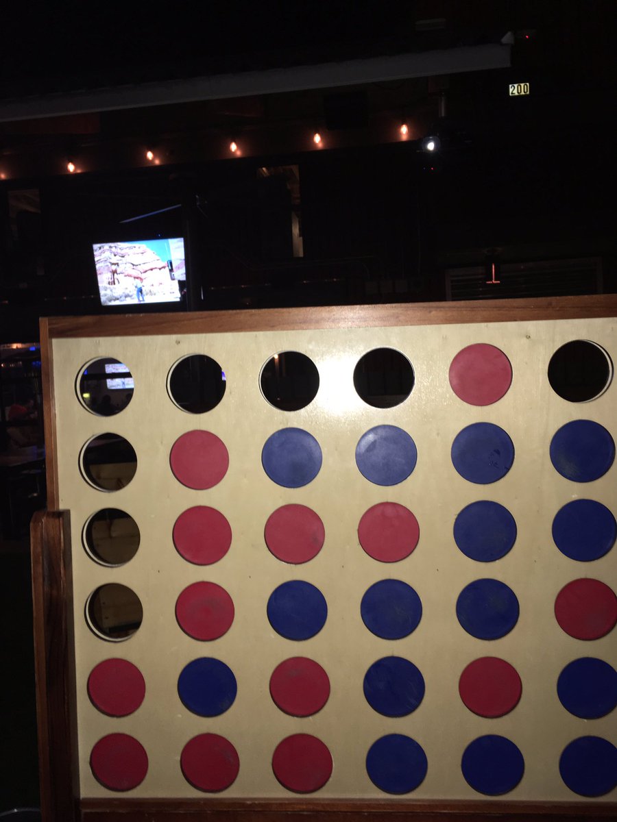 Playing Giganto Connect Four <a href="/TossPizzeria/">Toss Pizzeria & Pub</a>! Drink specials and half-price wings! What what!