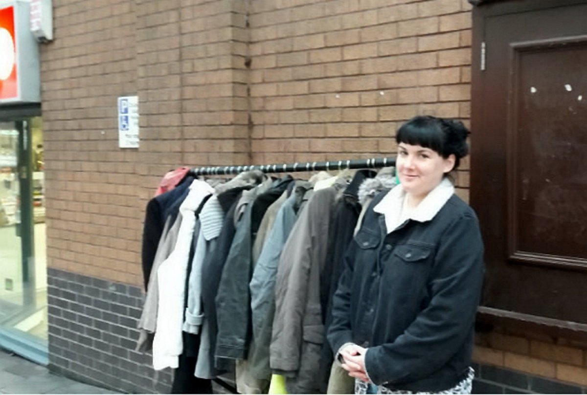 In #Bristol Sarah has set up a rail of coats in the street for homeless people who need them. #gifteconomy <a href="/BristolCalais/">CalaisRefugeeBristol</a>