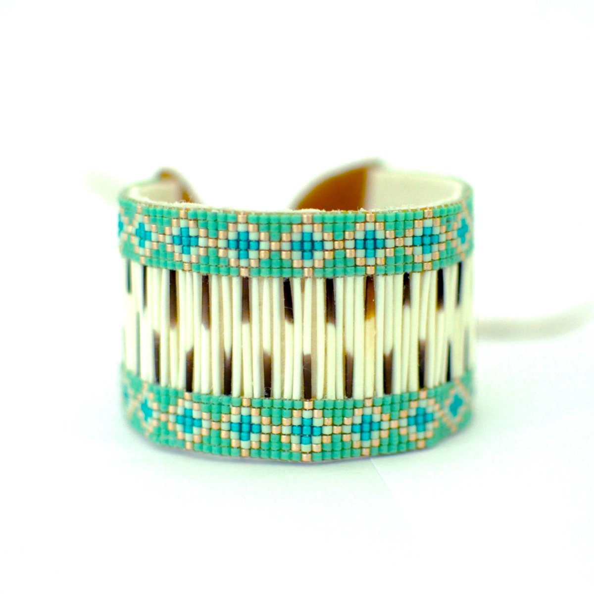 CforCjewelry's tweet photo. Turquoise/Gold porcupine quill woven cuff with tanned caribou hide, currently available for purchase at https://t.co/2lwySZkFFa * https://t.co/ymYxpMwQo7