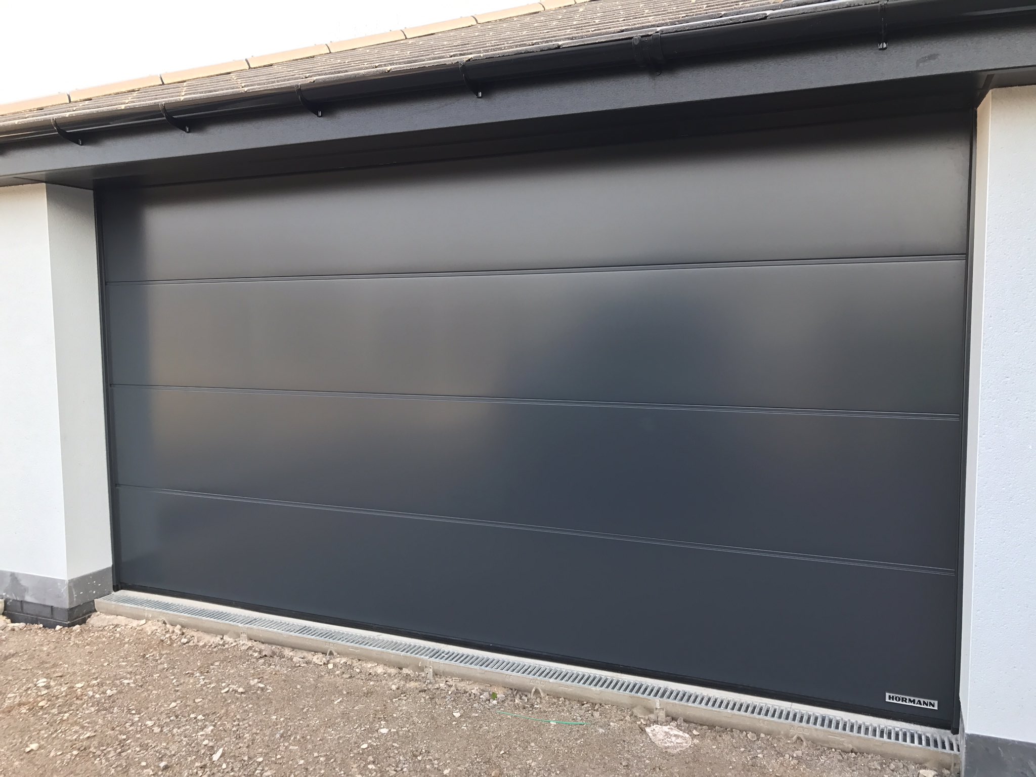 автоматические секционные ворота херман. гаражные ворота hormann. ворота секционные подъемные hormann. гаражная дверь nt 60 hormann s-гофр. херманн акционные ворота.