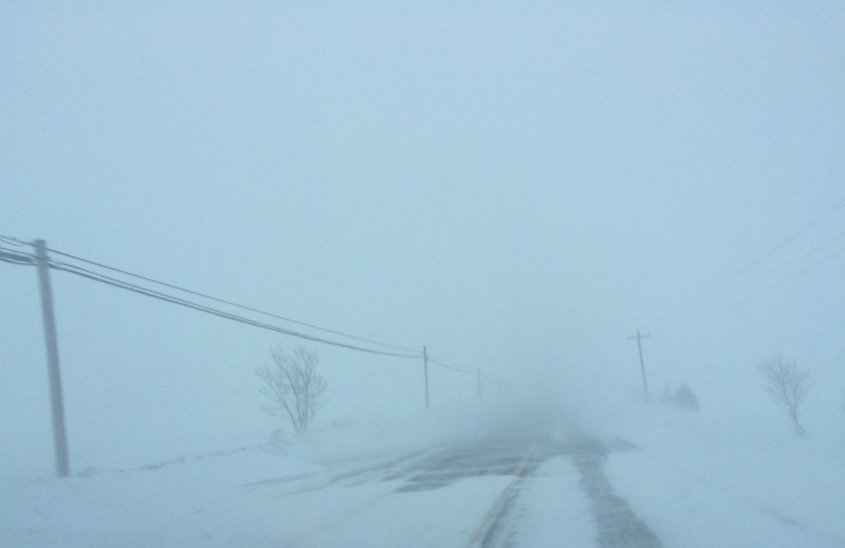 PEICorey's tweet photo. The view an hour ago: Pleasant Grove Rd , York Rd &amp; TCH near @JewellsMarket And now it's really snowing &amp; blowing. #pestorm #pei #staysafe https://t.co/AcMpdfcPyQ