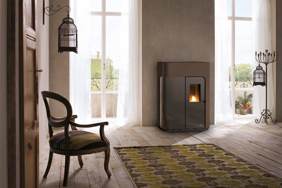 NuTech_Renew's tweet photo. Palazzetti Elisabeth #stove adds warmth + #style to the 2017 #interiordesign trend for patterns on rugs. #homedecor #design https://t.co/g5ATc4zjDX