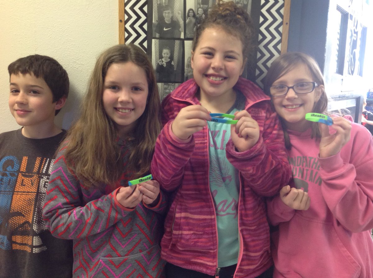 Proud of these 4th graders for earning their iRead40 bracelet today! #rssreads #achieve3000