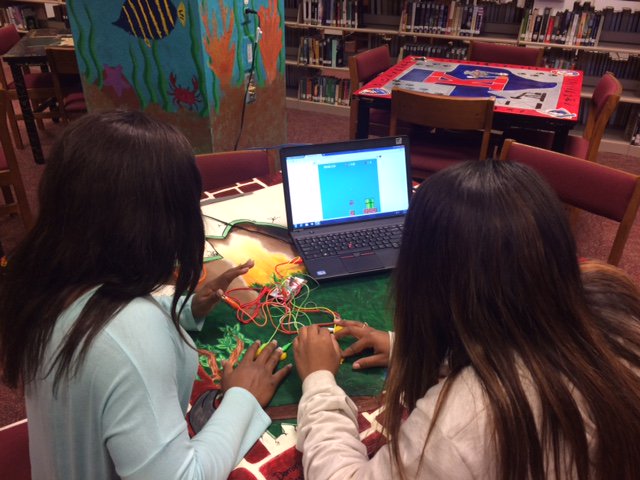 kdogslibrary's tweet photo. Mya &amp; Zekiea playing with the library's new Makey Makey we were finally able to purchase with EZ Mart grant funds! https://t.co/RnNerCfc5X