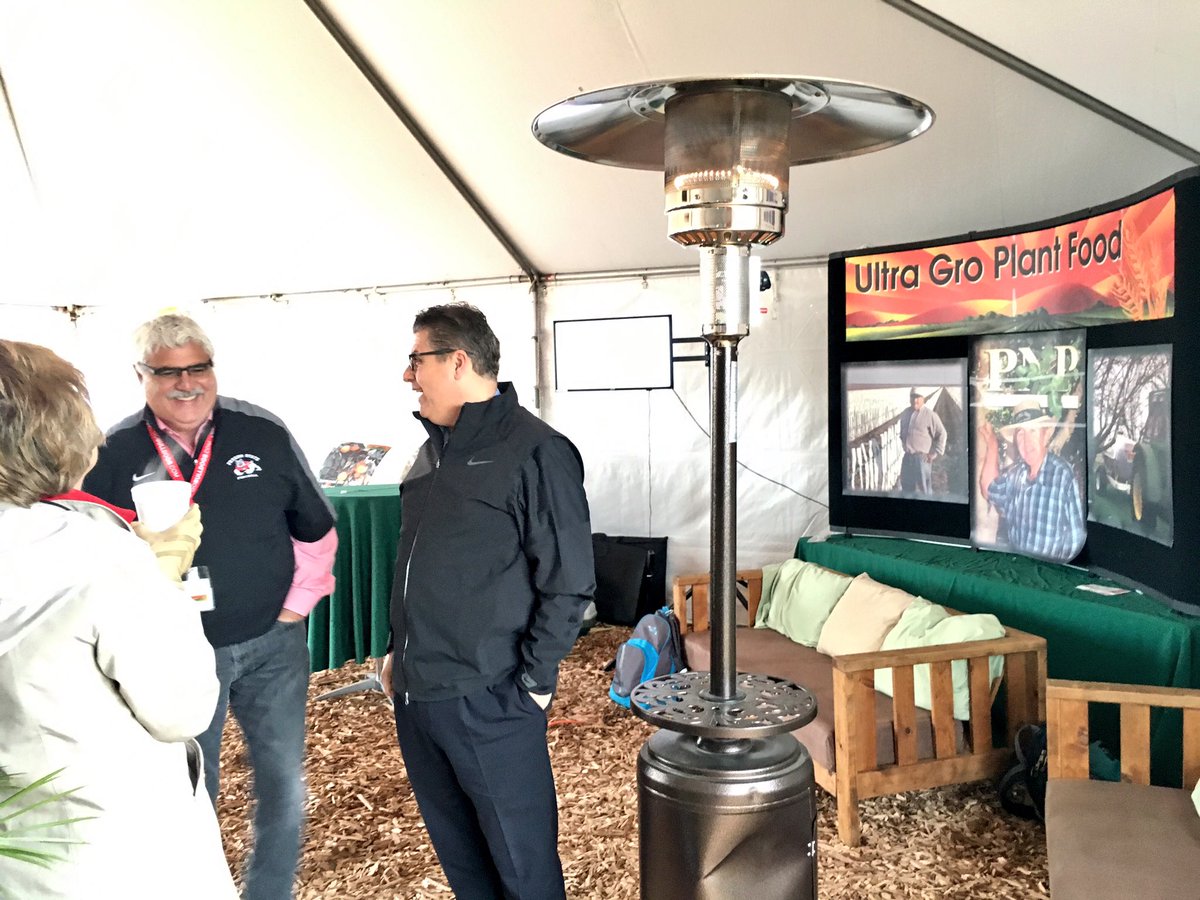 Fresno_State's tweet photo. Pres @JosephICastro meeting with Ag One & #FresnoState scholarship supporter Don Parreira of #UltraGro #PlantFood. #WAE17 @World_Ag_Expo https://t.co/lSe5bLn5kI