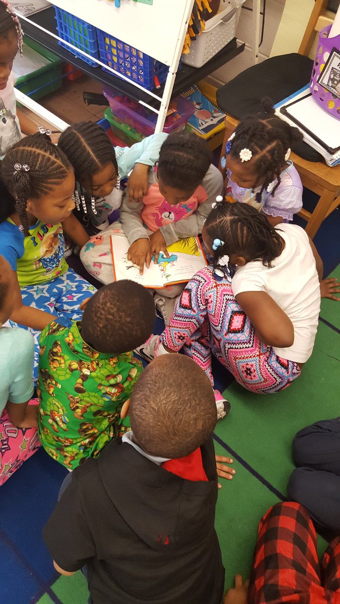 1st Graders collaborate while reading a #DrSeuss book on #ReadAcrossAmerica Day <a href="/TiltonSTEM/">Tilton Elementary</a>
