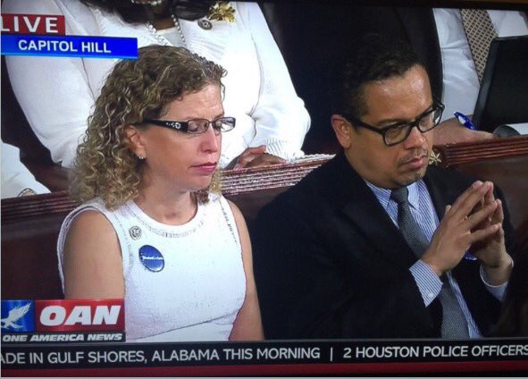 Muslim Brotherhood Keith Ellison &amp; Debbie Wasserman Schultz

Dressed In #KKK White

Refused To Stand &amp; Clap For #NavySEAL Widow Carryn Owens