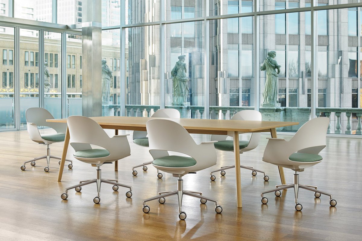 Copenhagen designer Martin Solem's table for  #BernhardtDesign, keeps cables tidy with hidden storage in each leg. bit.ly/2lytHb2