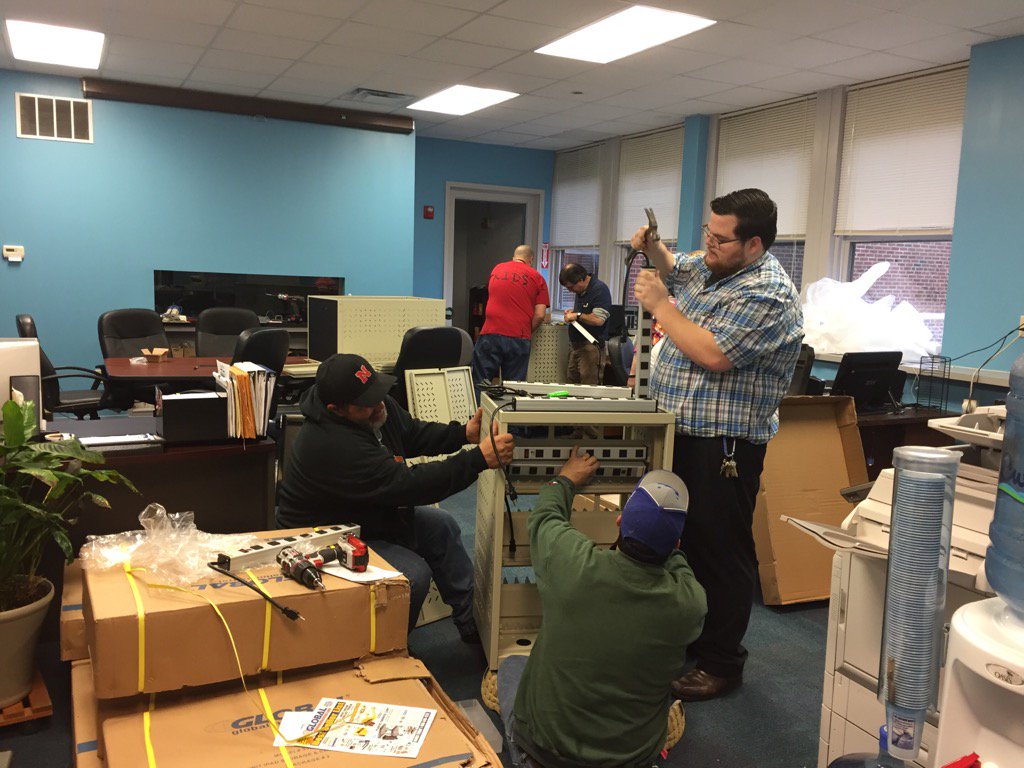JEGNGSSB's tweet photo. Our wonderful maintenance men (and Brad) putting the iPad charging carts together for student iPads. https://t.co/6kYOMMGnfv