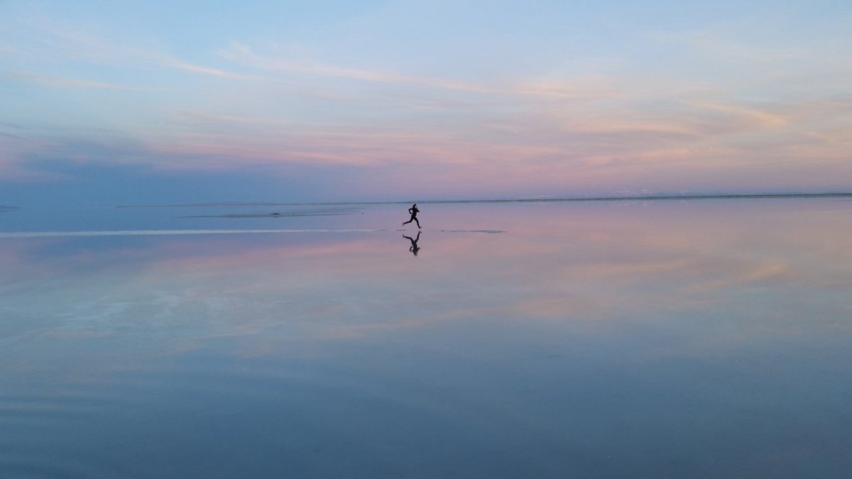 "Mirror," captured by our Scott Sannes while visiting the Salt Flats, is featured in our employee artwork calendar for March.