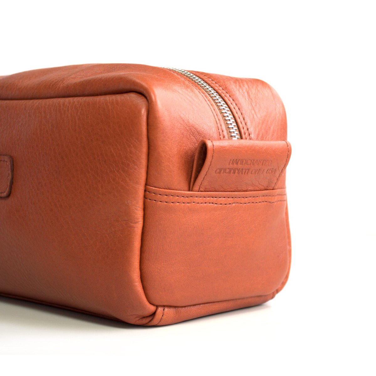 Our Cognac Dopp Kit is now available on our site. The perfect addition to your travel bag never looked so good. #doppkit #leathergoods  #otr