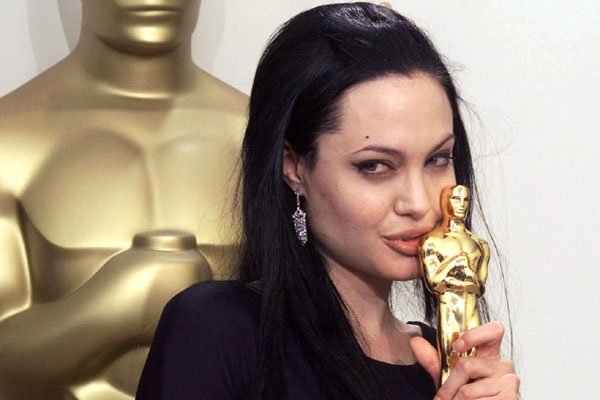 Kaiju_Kingz_'s tweet photo. Angelina Jolie and some of her awards https://t.co/FLrSEOmqa9