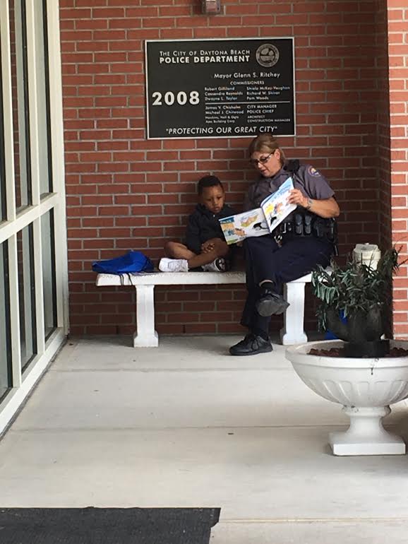 lydalonga4's tweet photo. This little guy got into trouble at school and DBPD Officer Debbie Yasinski spent time with him at police headquarters Wednesday. https://t.co/LHcSt0jInQ