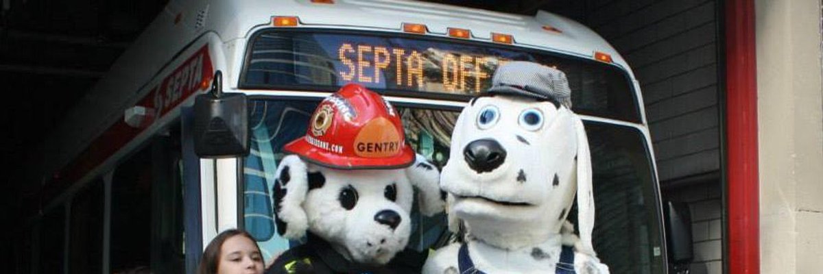 Transit_Dog's tweet photo. #tbt to when I was white with brown spots for some reason and me and @FireDept_Dog got out to teach fire safety to kids. https://t.co/JdtW5DVFLW