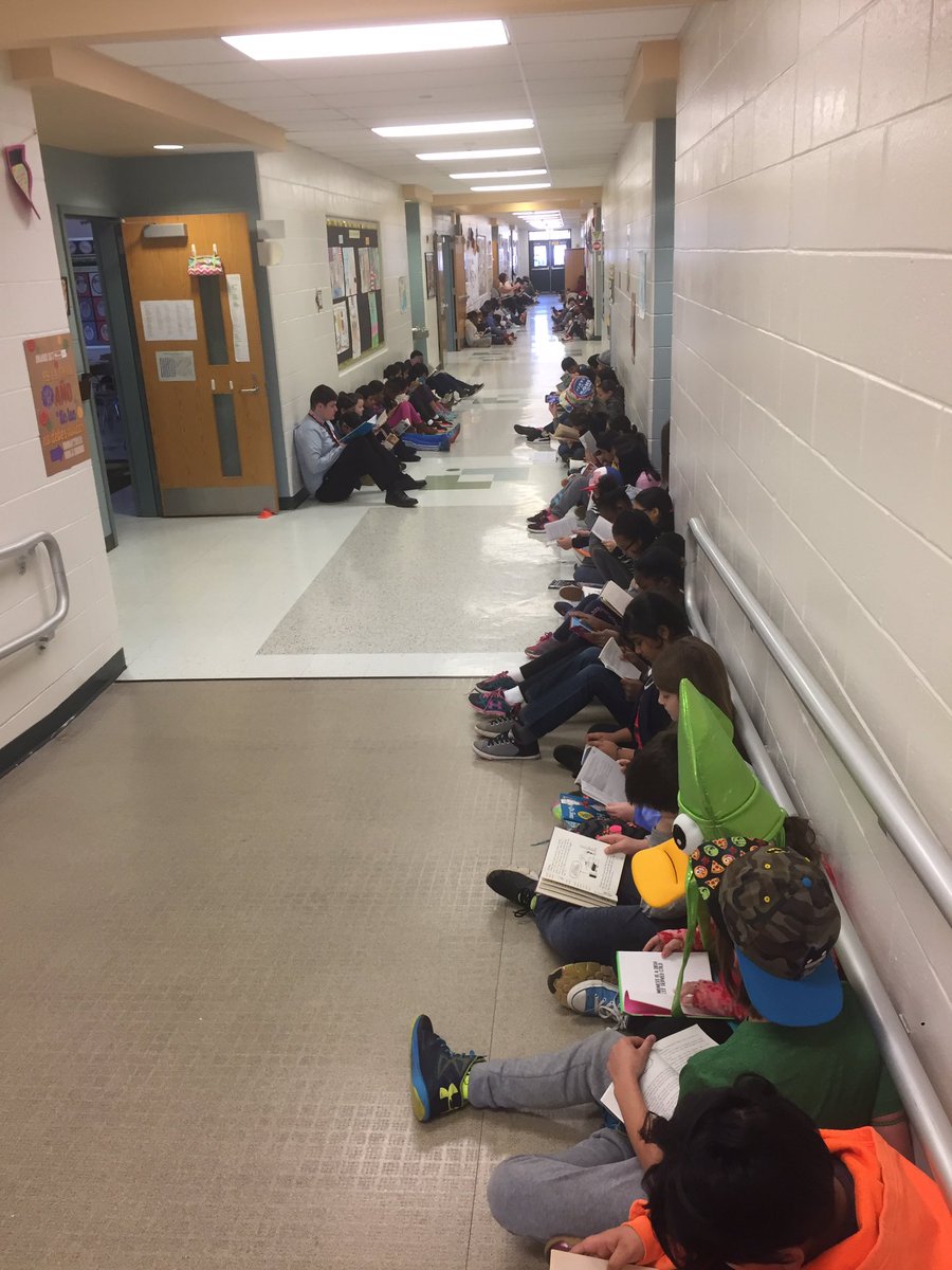 solcott4's tweet photo. GB celebrating Dr. Seuss by lining the hallways for a little D.E.A.R. time! @AileenBeck68 @FatimaCaneja @SBSDGB @jodi_mahoney @sfehte_SBSD https://t.co/XyRO1Z8EWQ