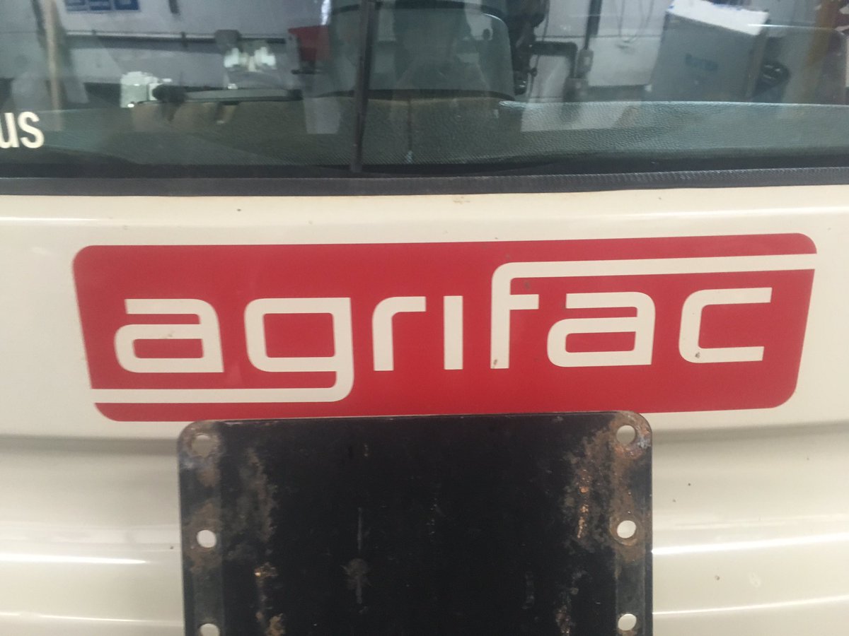 Keeping warm @AgrifacUKLtd today fitting another tmx display into this condor, with serial rate control for section control great setup